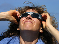 Woman wearing eclipse shades